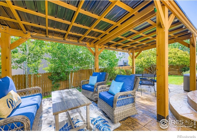 13065 Tamarac Pl, Thornton, CO 80602 - fenced backyard with outdoor lounge area, a patio area, and outdoor dining space