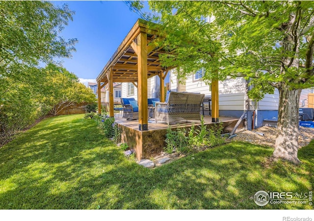 13065 Tamarac Pl, Thornton, CO 80602 - fenced backyard featuring a patio and outdoor lounge area