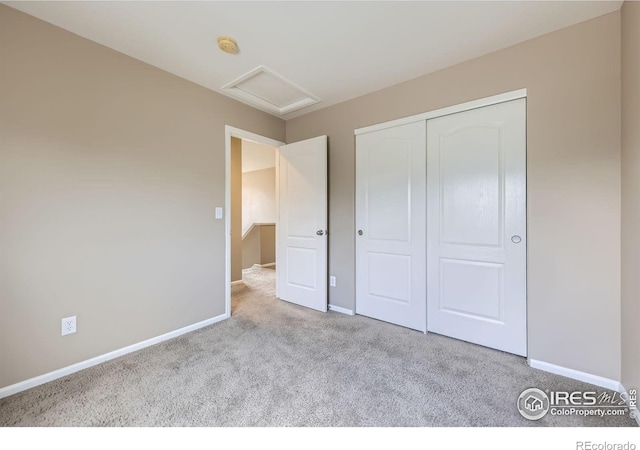 13065 Tamarac Pl, Thornton, CO 80602 - unfurnished bedroom featuring carpet flooring, attic access, and a closet
