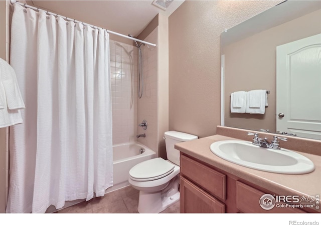 13065 Tamarac Pl, Thornton, CO 80602 - full bath featuring shower / bath combo, tile patterned flooring, and vanity