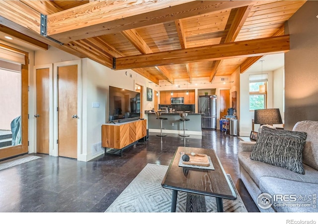 801 Confidence Dr Unit 16, Longmont, CO 80504 - living area featuring a wood ceiling with exposed beams and baseboards