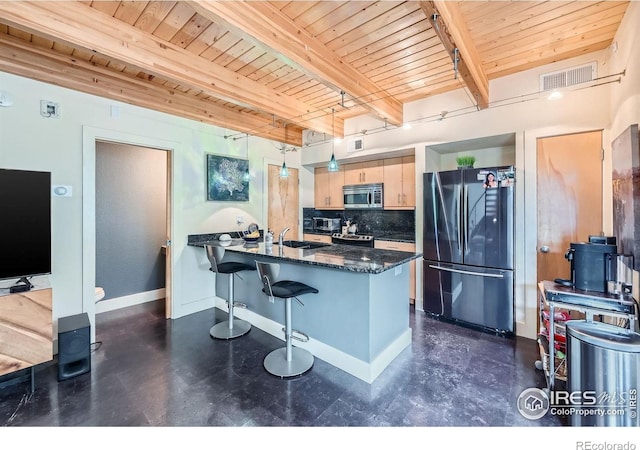 801 Confidence Dr Unit 16, Longmont, CO 80504 - kitchen with stainless steel appliances, a wood ceiling with exposed beams, a peninsula, backsplash, and dark stone countertops