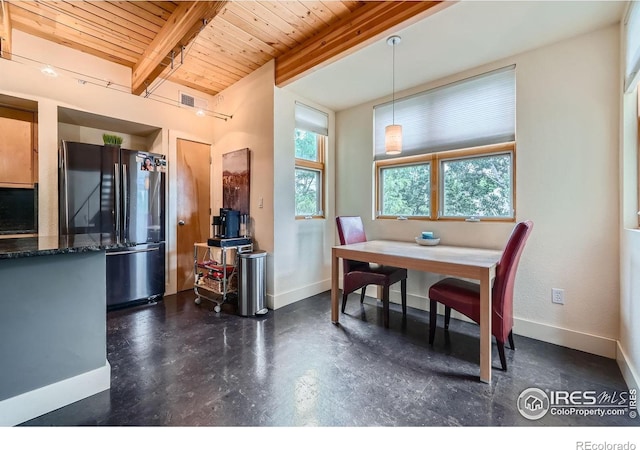 801 Confidence Dr Unit 16, Longmont, CO 80504 - dining room with a wood ceiling with exposed beams and baseboards