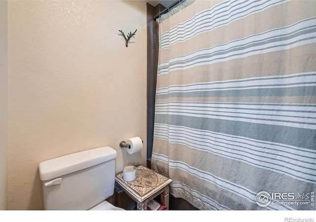 801 Confidence Dr Unit 16, Longmont, CO 80504 - full bath with toilet and a shower with shower curtain