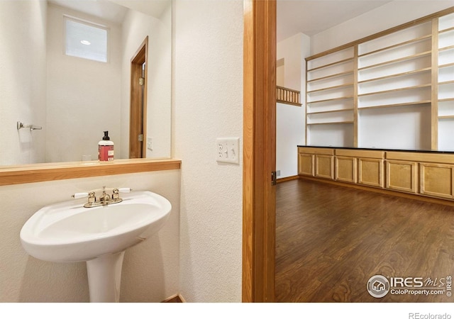 3686 Oakwood Dr, Longmont, CO 80503 - bathroom featuring wood finished floors and a sink