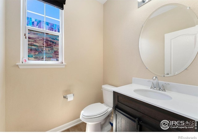 5049 S Ukraine St, Aurora, CO 80015 - bathroom featuring vanity and tile patterned flooring