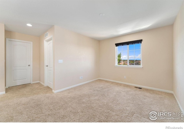 5049 S Ukraine St, Aurora, CO 80015 - unfurnished room with carpet floors and recessed lighting
