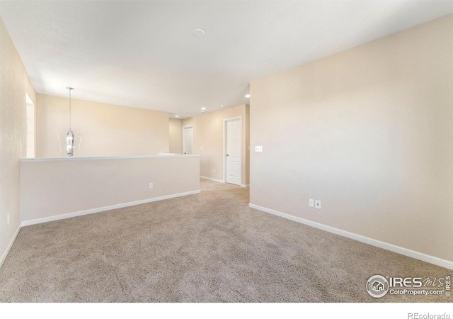 5049 S Ukraine St, Aurora, CO 80015 - unfurnished room with carpet floors and recessed lighting