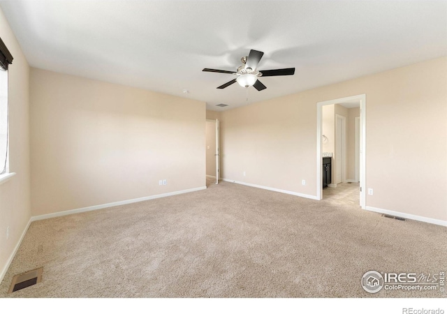 5049 S Ukraine St, Aurora, CO 80015 - unfurnished room with light colored carpet and ceiling fan