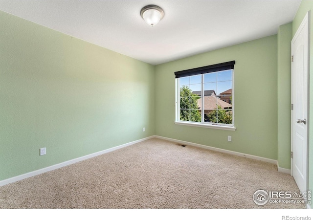 5049 S Ukraine St, Aurora, CO 80015 - unfurnished room featuring carpet