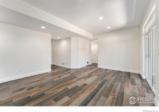 5049 S Ukraine St, Aurora, CO 80015 - empty room with wood finished floors and recessed lighting