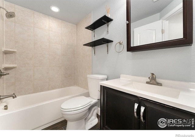 5049 S Ukraine St, Aurora, CO 80015 - bathroom featuring vanity, shower / tub combination, and recessed lighting