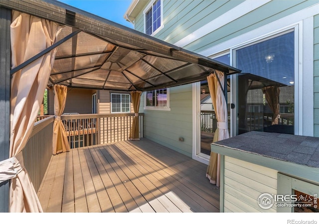 5049 S Ukraine St, Aurora, CO 80015 - wooden terrace featuring a gazebo