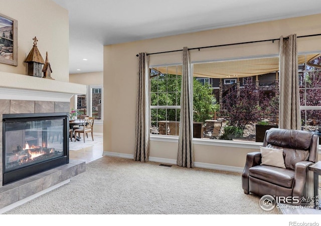 15002 Cosmos Way, Broomfield, CO 80023 - living area with carpet floors, a fireplace, and recessed lighting
