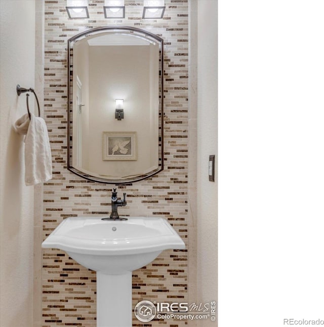 15002 Cosmos Way, Broomfield, CO 80023 - bathroom featuring tile walls