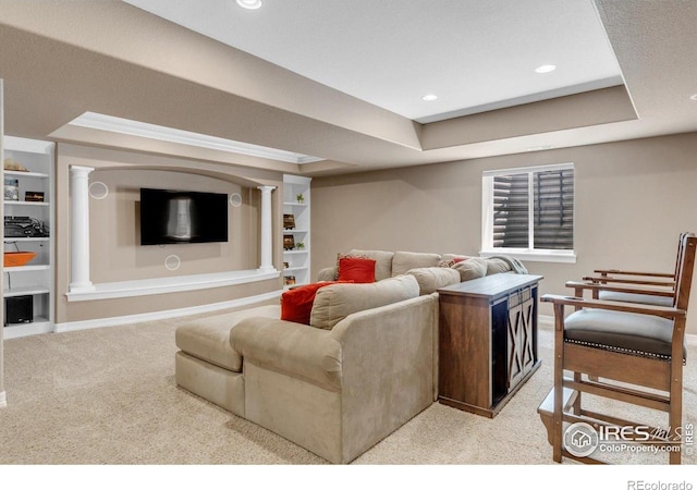 15002 Cosmos Way, Broomfield, CO 80023 - living room with a tray ceiling, decorative columns, light colored carpet, recessed lighting, and built in shelves