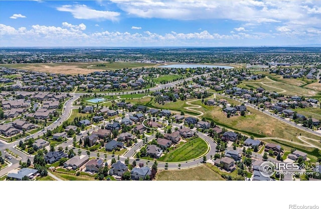 15002 Cosmos Way, Broomfield, CO 80023 - aerial view of property and surrounding area featuring nearby suburban area and a nearby body of water