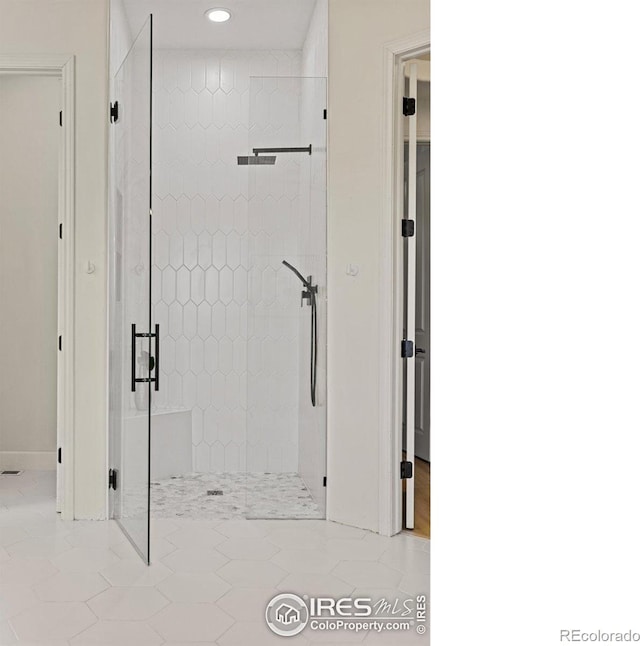16636 Krameria Way, Brighton, CO 80602 - bathroom with a stall shower, recessed lighting, and tile patterned floors