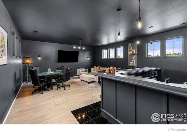 16636 Krameria Way, Brighton, CO 80602 - recreation room with wood finished floors and baseboards