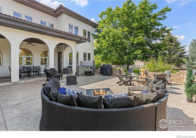 16636 Krameria Way, Brighton, CO 80602 - view of patio with an outdoor living space with a fire pit, area for grilling, outdoor dining area, and a hot tub