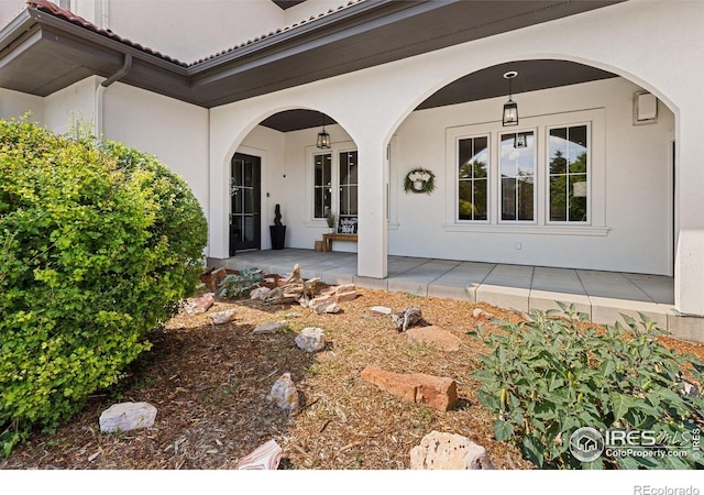 16636 Krameria Way, Brighton, CO 80602 - view of exterior entry featuring stucco siding