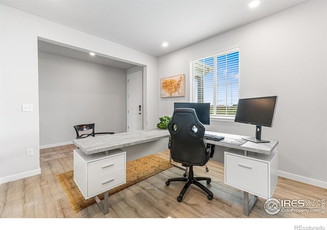 5766 Ranch St, Longmont, CO 80504 - office area featuring light wood-style floors and recessed lighting