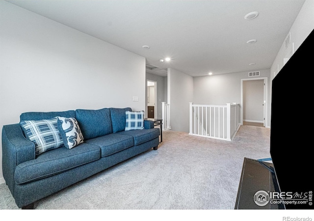5766 Ranch St, Longmont, CO 80504 - carpeted living room featuring recessed lighting