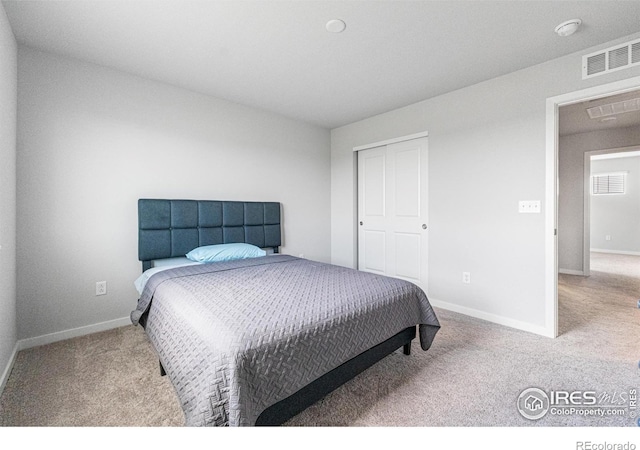 5766 Ranch St, Longmont, CO 80504 - bedroom featuring carpet floors and a closet