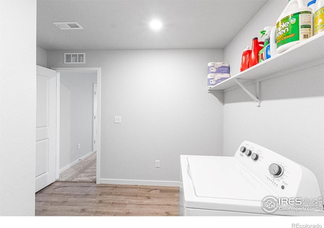 5766 Ranch St, Longmont, CO 80504 - laundry area with washer / clothes dryer, wood finished floors, and recessed lighting