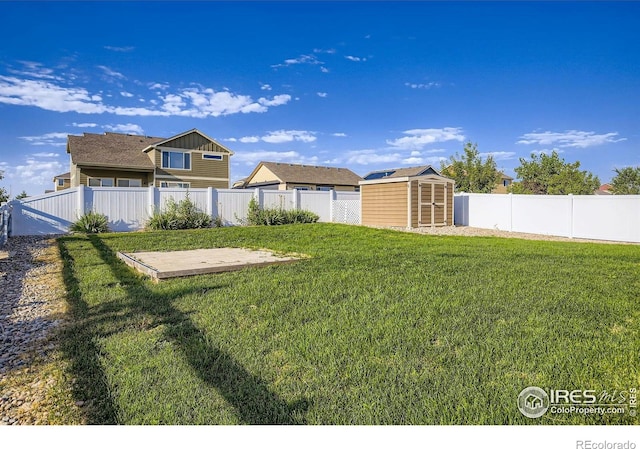 1541 Water Vista Ln, Severance, CO 80550 - fenced backyard with a storage unit