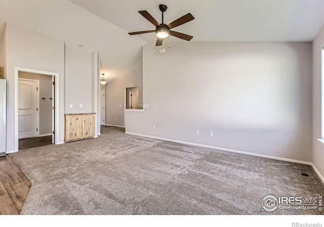 1541 Water Vista Ln, Severance, CO 80550 - unfurnished living room with a ceiling fan, carpet flooring, and high vaulted ceiling