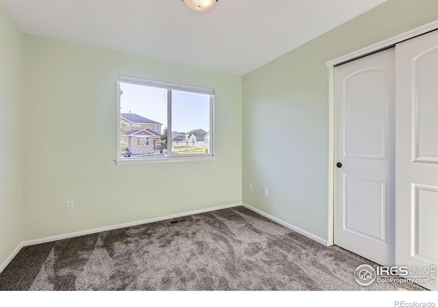 1541 Water Vista Ln, Severance, CO 80550 - carpeted spare room featuring baseboards
