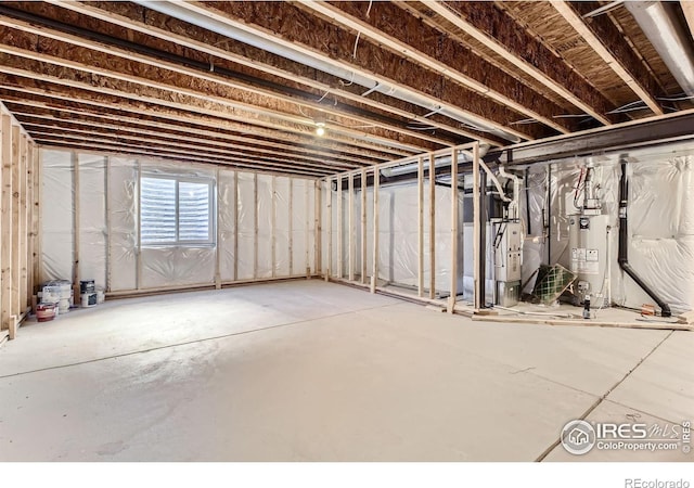 1541 Water Vista Ln, Severance, CO 80550 - below grade area featuring gas water heater and heating unit