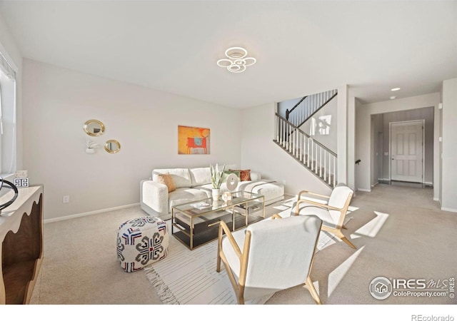 5217 Alberta Falls St, Timnath, CO 80547 - carpeted living room with baseboards and stairs