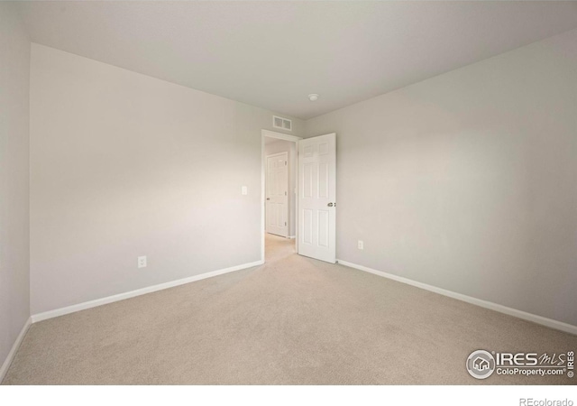 5217 Alberta Falls St, Timnath, CO 80547 - carpeted spare room featuring baseboards