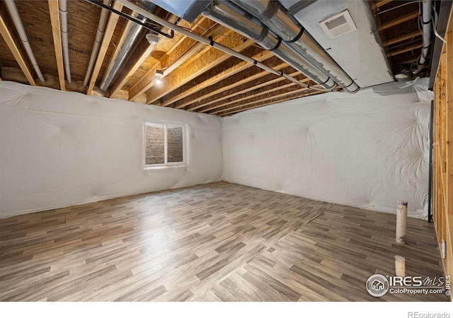 5217 Alberta Falls St, Timnath, CO 80547 - basement featuring wood finished floors