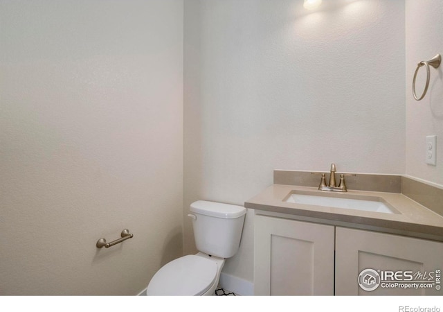 24113 E 36th Pl, Aurora, CO 80019 - bathroom with toilet and vanity