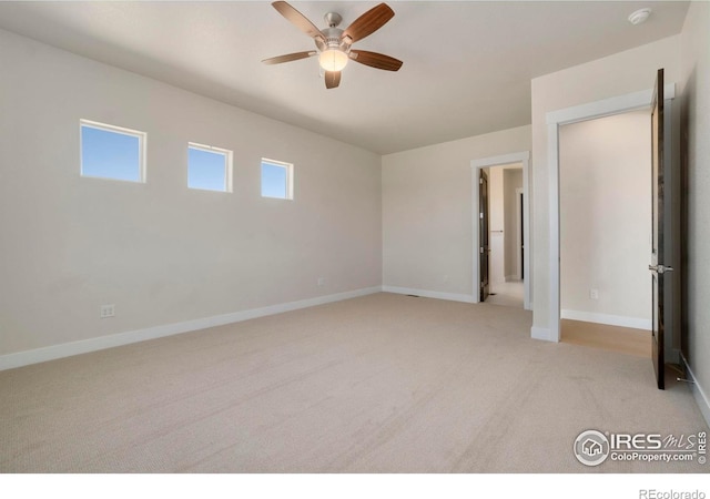 24113 E 36th Pl, Aurora, CO 80019 - unfurnished bedroom featuring light carpet and a ceiling fan