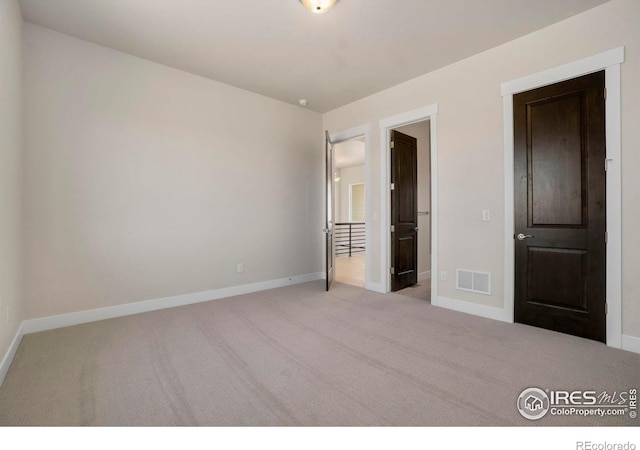 24113 E 36th Pl, Aurora, CO 80019 - unfurnished bedroom featuring carpet floors