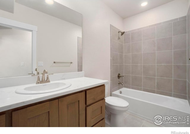 24113 E 36th Pl, Aurora, CO 80019 - bathroom featuring vanity, shower / bathtub combination, tile patterned floors, and recessed lighting