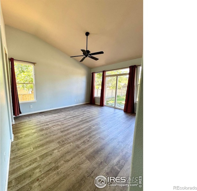 2395 Sandpiper Dr, Lafayette, CO 80026 - unfurnished room featuring ceiling fan, vaulted ceiling, healthy amount of natural light, and wood finished floors