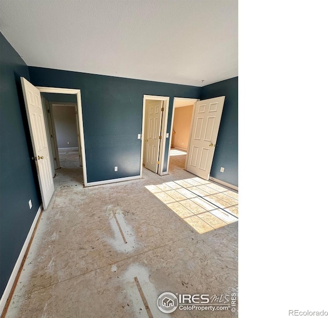 2395 Sandpiper Dr, Lafayette, CO 80026 - unfurnished bedroom with baseboards