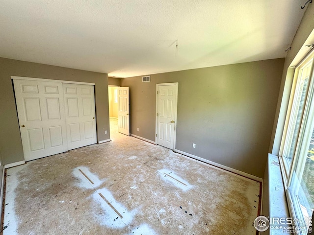 2395 Sandpiper Dr, Lafayette, CO 80026 - unfurnished bedroom with a closet and baseboards