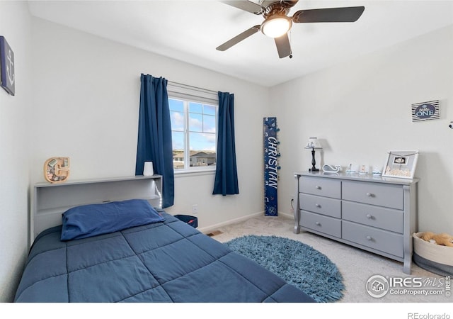 14203 Hop Clover Trl, Parker, CO 80134 - bedroom featuring light colored carpet and a ceiling fan