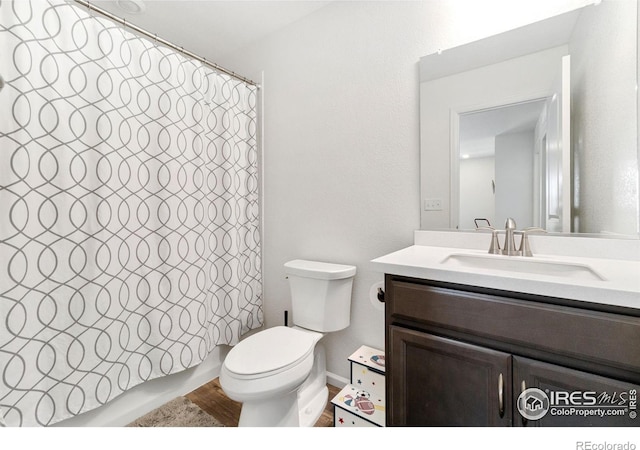 14203 Hop Clover Trl, Parker, CO 80134 - full bathroom featuring vanity and wood finished floors