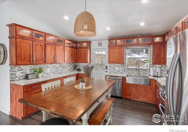 3367 Badger Creek Rd, Hartsel, CO 80449 - kitchen featuring appliances with stainless steel finishes, tasteful backsplash, dark wood-type flooring, pendant lighting, and recessed lighting