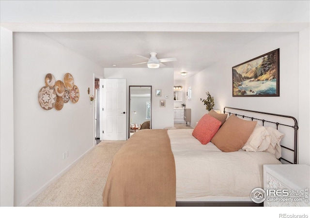 3367 Badger Creek Rd, Hartsel, CO 80449 - carpeted bedroom featuring connected bathroom and a ceiling fan
