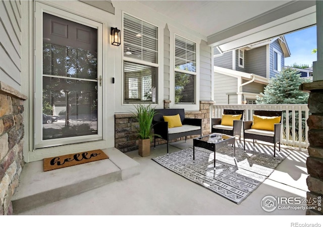 2262 Harvest St, Fort Collins, CO 80528 - porch featuring an outdoor living space