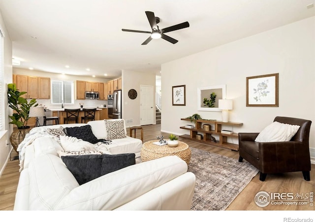 2262 Harvest St, Fort Collins, CO 80528 - living room featuring a ceiling fan, light wood-type flooring, and recessed lighting