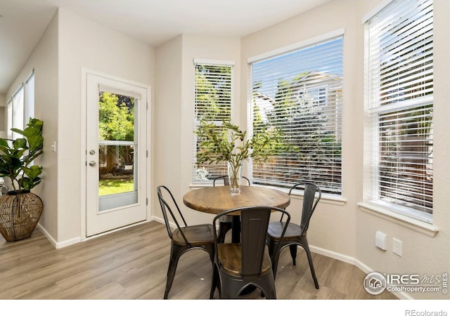 2262 Harvest St, Fort Collins, CO 80528 - dining room with light wood-type flooring and baseboards